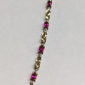 Elegant Gold and Pink Bracelet
